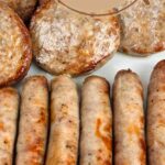 Cooked breakfast links and patties on a white plate. Text reads: air fryer breakfast sausage, whatacrockof.com