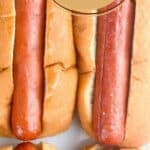 Picture of air fryer hot dogs. Text reads: air fryer hot dogs, whatacrockof.com